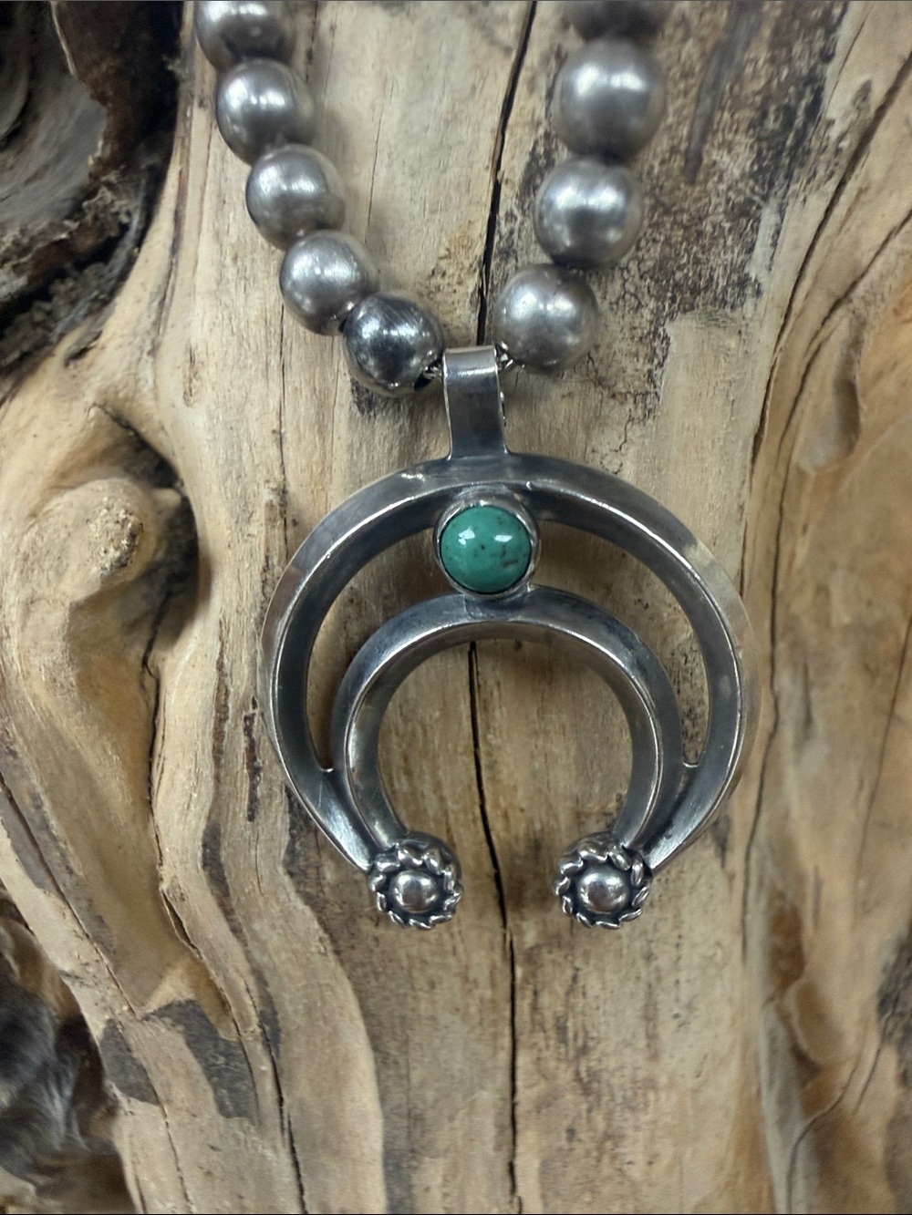 Collectible “BELL TRADING POST” necklace.